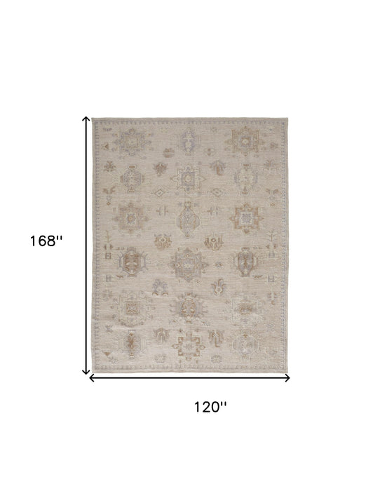 4' X 6' Tan And Brown Floral Hand Knotted Stain Resistant Area Rug