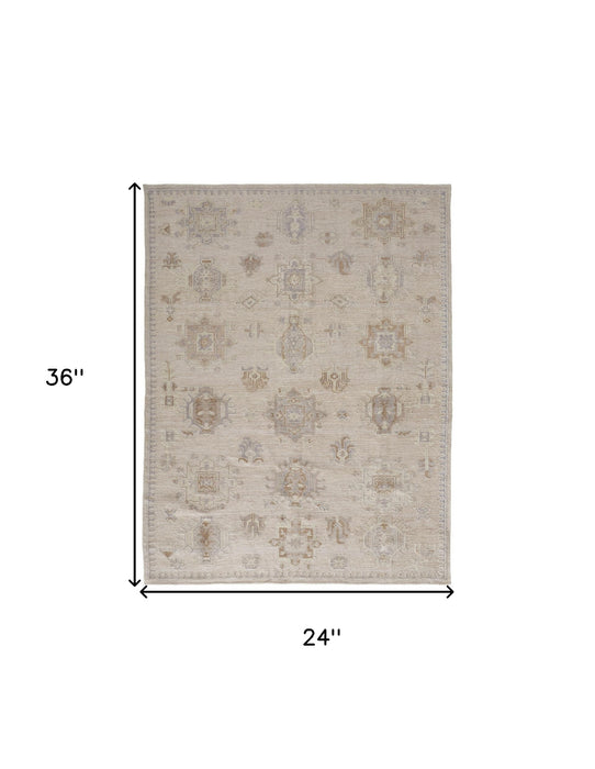 4' X 6' Tan And Brown Floral Hand Knotted Stain Resistant Area Rug