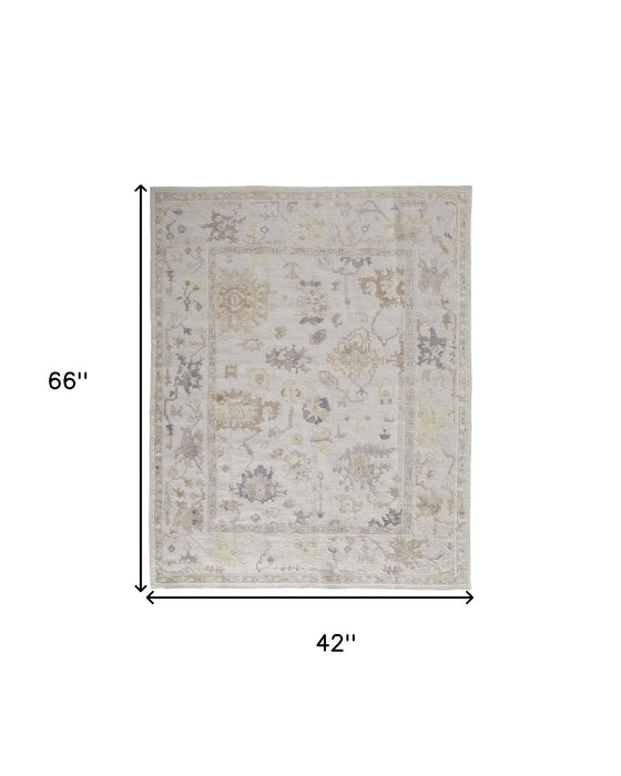 4' X 6' Tan Ivory And Orange Floral Hand Knotted Stain Resistant Area Rug