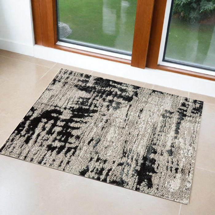 10' X 13' Black White And Gray Stain Resistant Area Rug