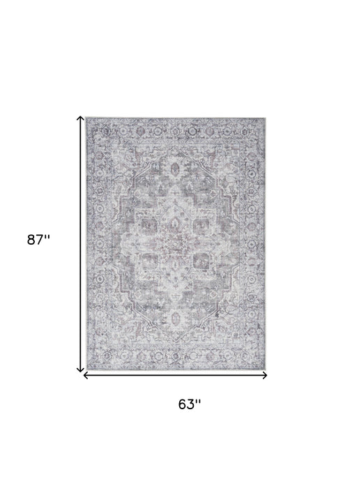 5' X 7' Blue And Pink Floral Power Loom Distressed Washable Area Rug