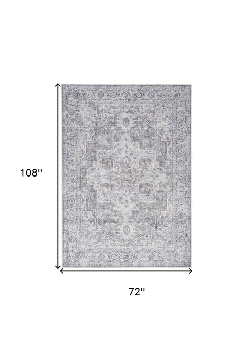 6' X 9' Blue And Pink Floral Power Loom Distressed Washable Area Rug