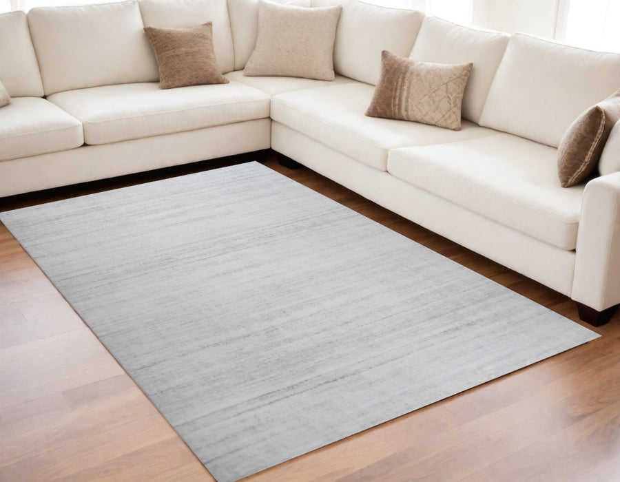 5' X 8' Beige Abstract Area Rug