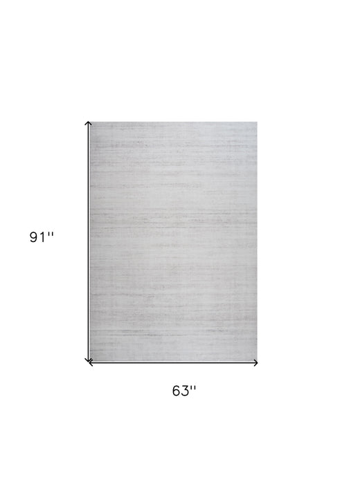 5' X 8' Beige Abstract Area Rug