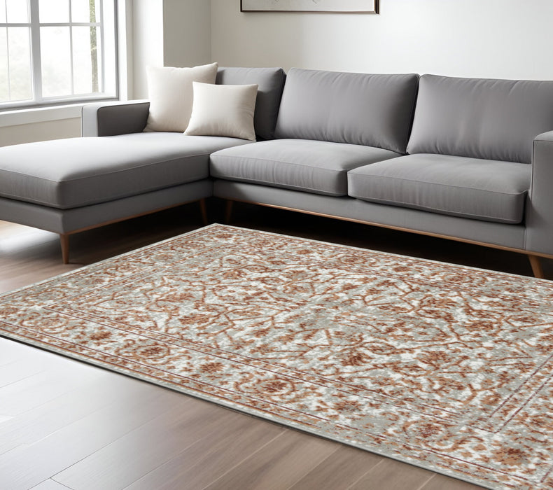 10' X 14' Rust and Gray Floral Power Loom Area Rug