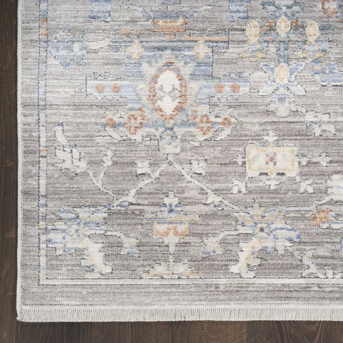 8' X 10' Ivory Blue and Gray Oriental Power Loom Distressed Area Rug With Fringe