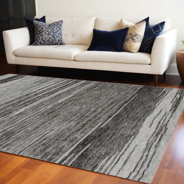 7' X 10' Gray and Black Abstract Power Loom Distressed Non Skid Area Rug