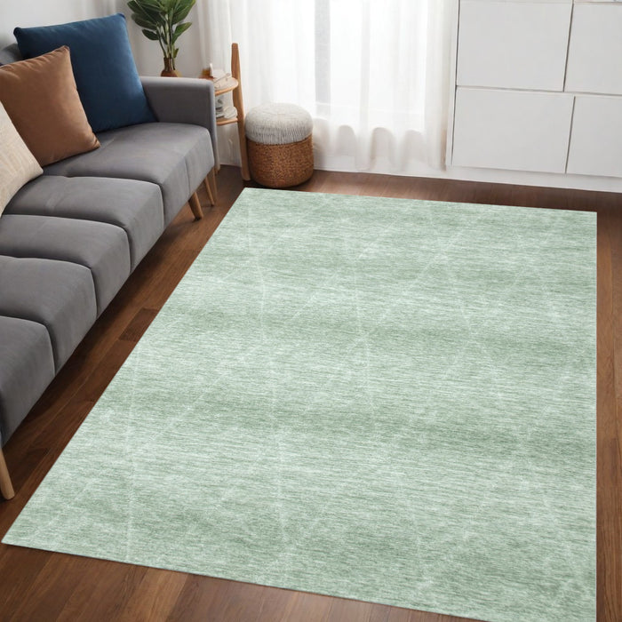 5' X 8' Green and Ivory Geometric Power Loom Distressed Non Skid Area Rug