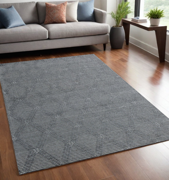 5' X 8' Gray and Ivory Geometric Hand Woven Non Skid Area Rug