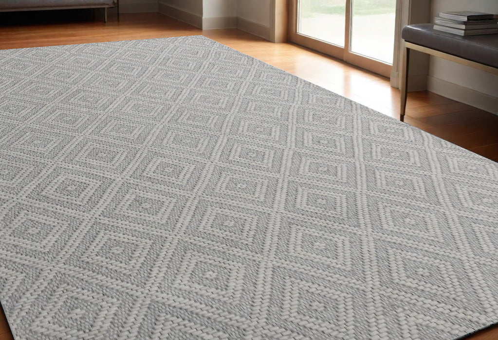 5' X 8' Gray and Ivory Geometric Hand Woven Non Skid Area Rug