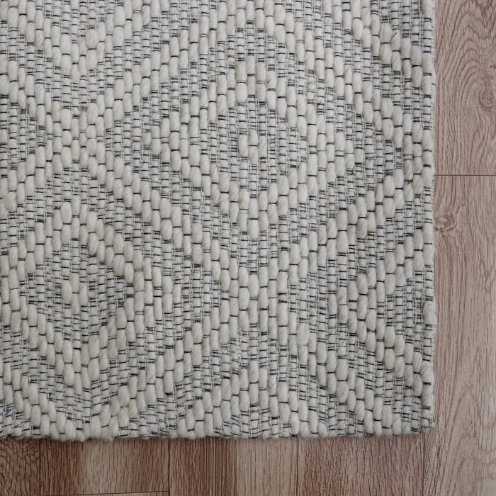 5' X 8' Gray and Ivory Geometric Hand Woven Non Skid Area Rug