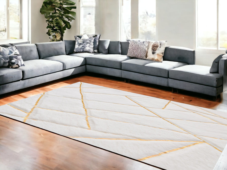 4' X 6' White and Gold Faux Fur Abstract Shag Non Skid Area Rug