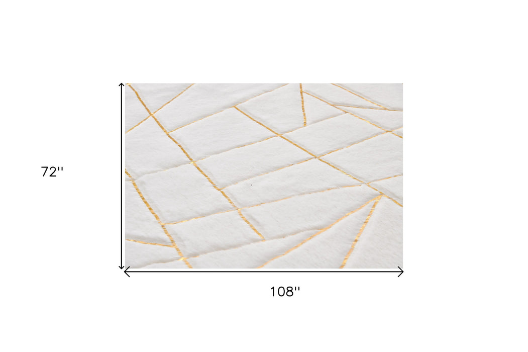 4' X 6' White and Gold Faux Fur Abstract Shag Non Skid Area Rug