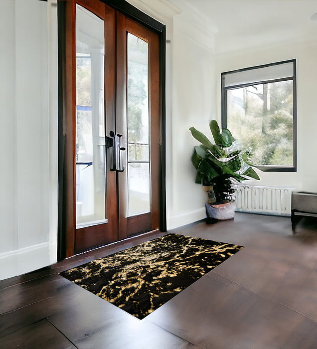 4' X 6' Black and Gold Faux Fur Abstract Shag Non Skid Area Rug