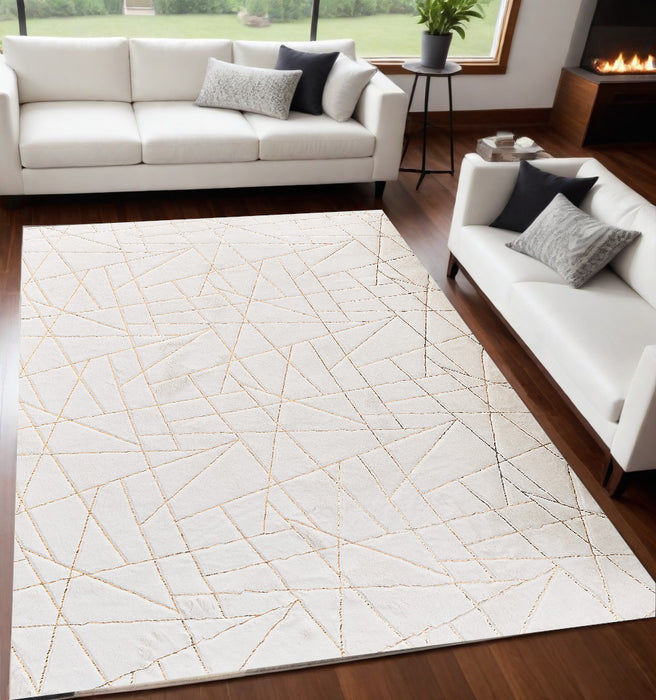 4' X 6' White and Gold Faux Fur Abstract Shag Non Skid Area Rug