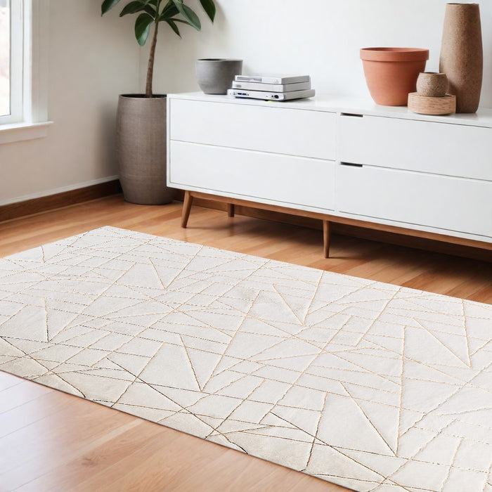 4' X 6' White and Gold Faux Fur Abstract Shag Non Skid Area Rug