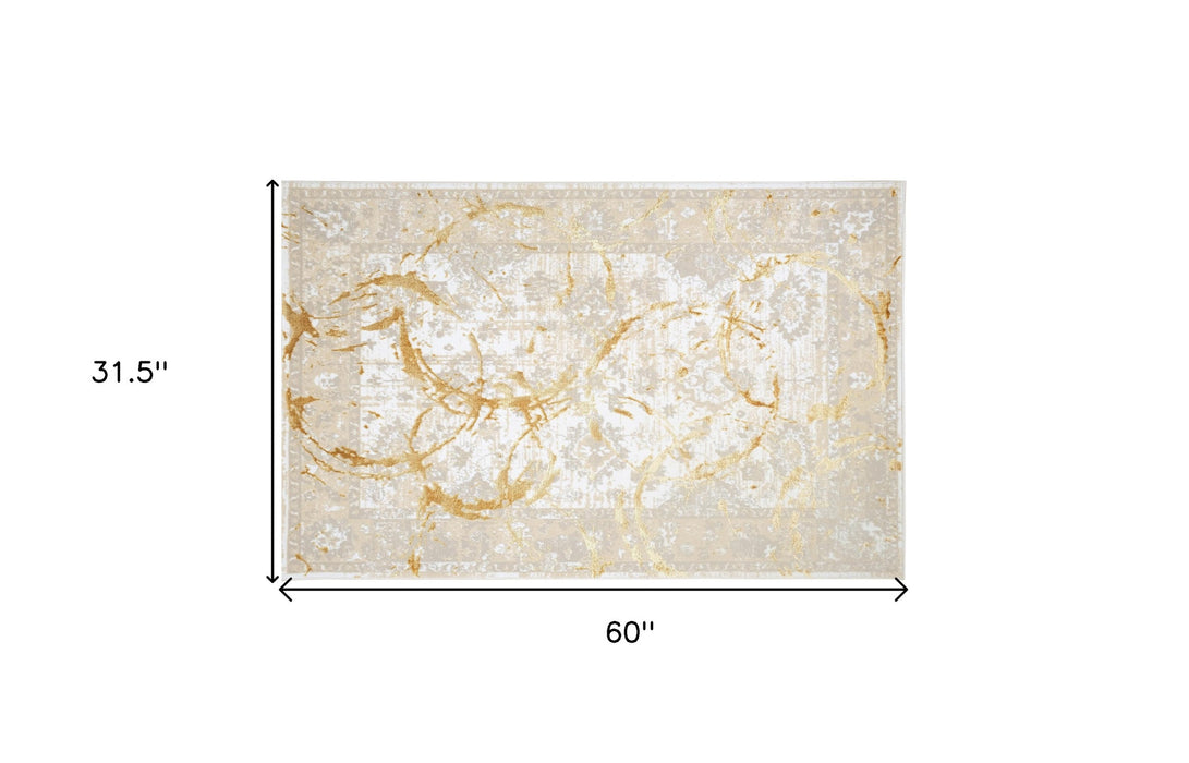 5' X 8' Beige and Gold Abstract Area Rug