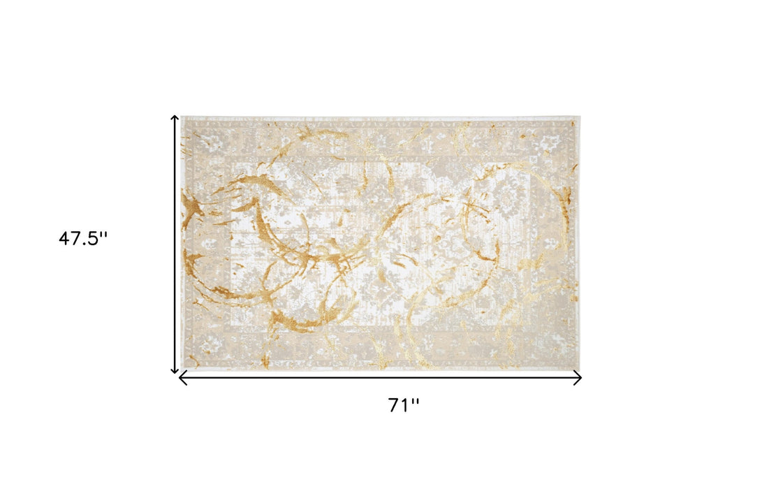 5' X 8' Beige and Gold Abstract Area Rug