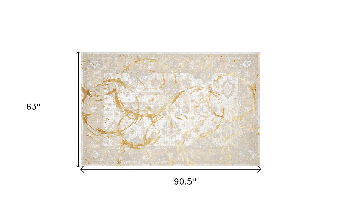 5' X 8' Beige and Gold Abstract Area Rug