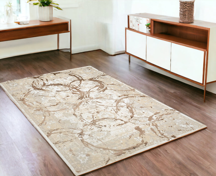 3' X 5' Beige and Gold Abstract Area Rug