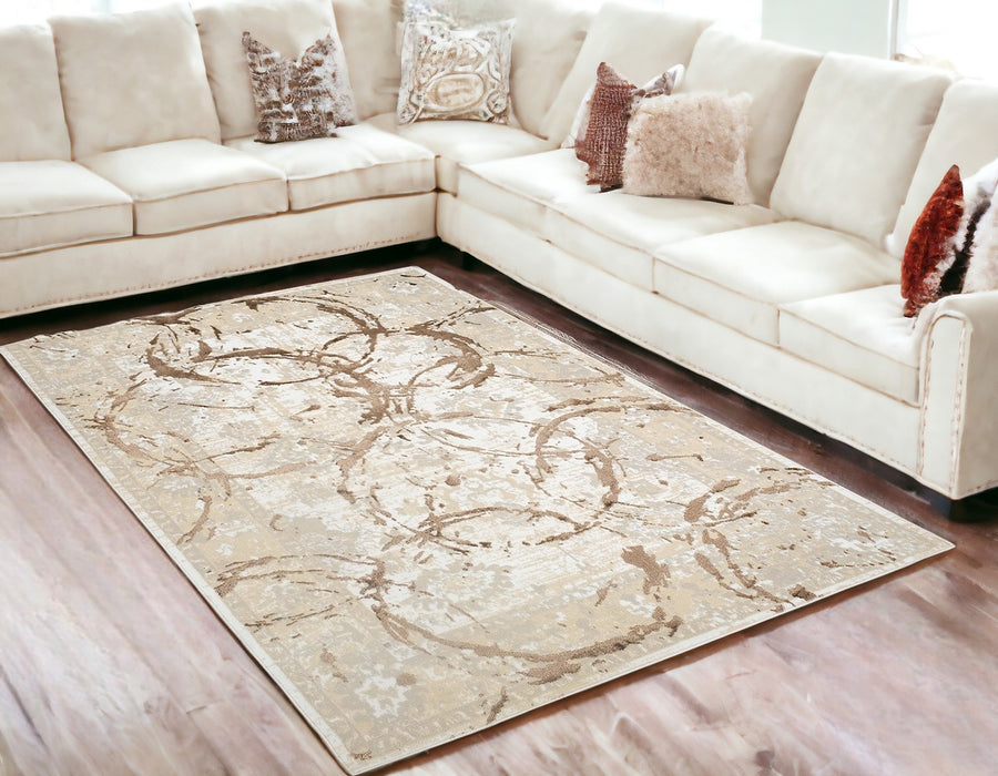 3' X 5' Beige and Gold Abstract Area Rug