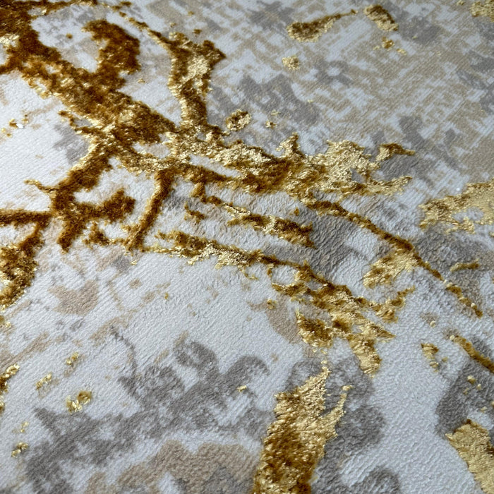 5' X 8' Ivory and Gold Abstract Area Rug