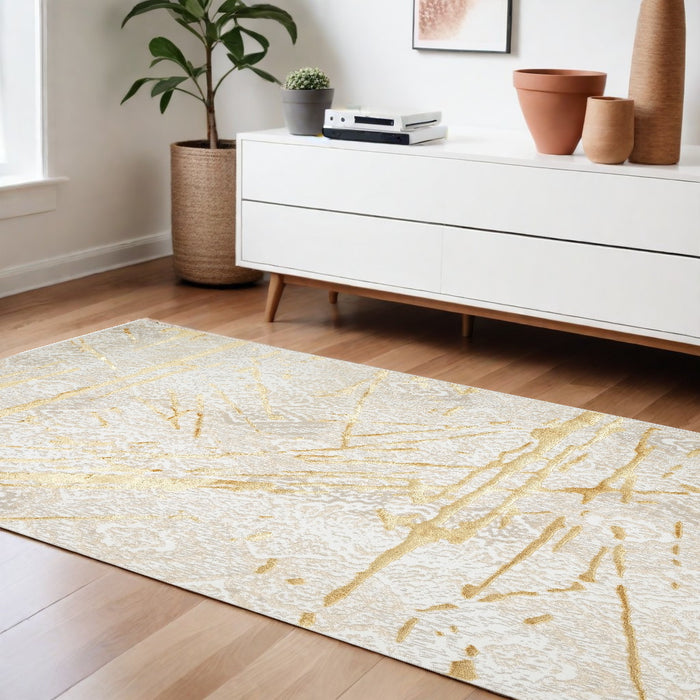 5' X 8' Ivory and Gold Abstract Area Rug