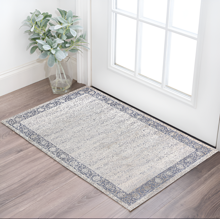 2' X 3' Blue and Beige Floral Area Rug