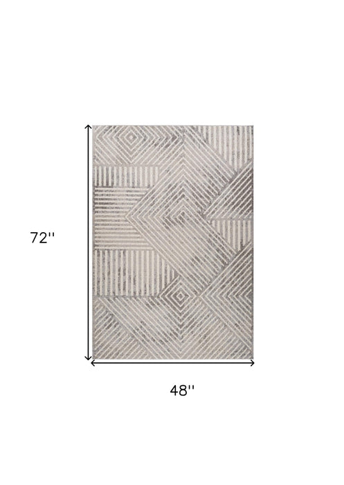 4' X 6' Gray and Beige Abstract Distressed Area Rug