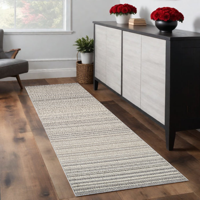 8' Gray and Beige Abstract Distressed Area Rug