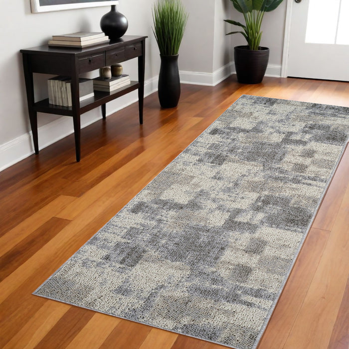 8' Gray and Beige Abstract Distressed Area Rug