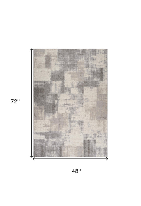 4' X 6' Gray and Beige Abstract Distressed Area Rug