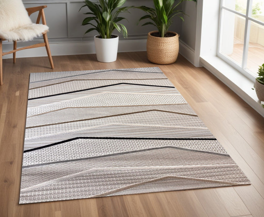 4' X 6' Gray Brown and Beige Abstract Area Rug