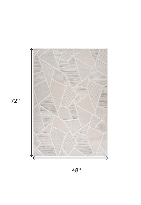 4' X 6' Cream and Beige Geometric Distressed Area Rug