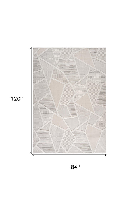 7' X 10' Cream and Beige Geometric Distressed Area Rug