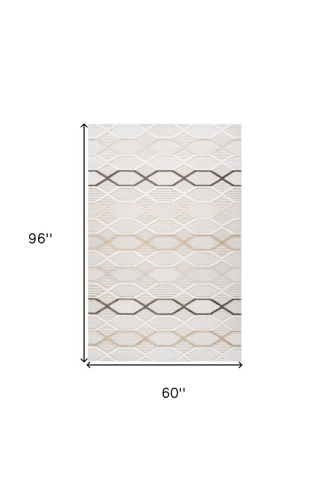 5' X 8' Cream and Beige Abstract Distressed Area Rug