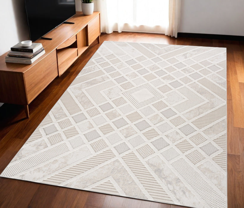 5' X 8' Cream and Beige Abstract Distressed Area Rug