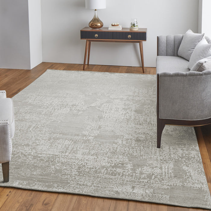 4' X 6' Gray and Ivory Abstract Hand Woven Worn Faded Area Rug