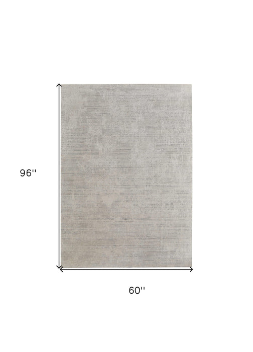 4' X 6' Gray and Ivory Abstract Hand Woven Worn Faded Area Rug