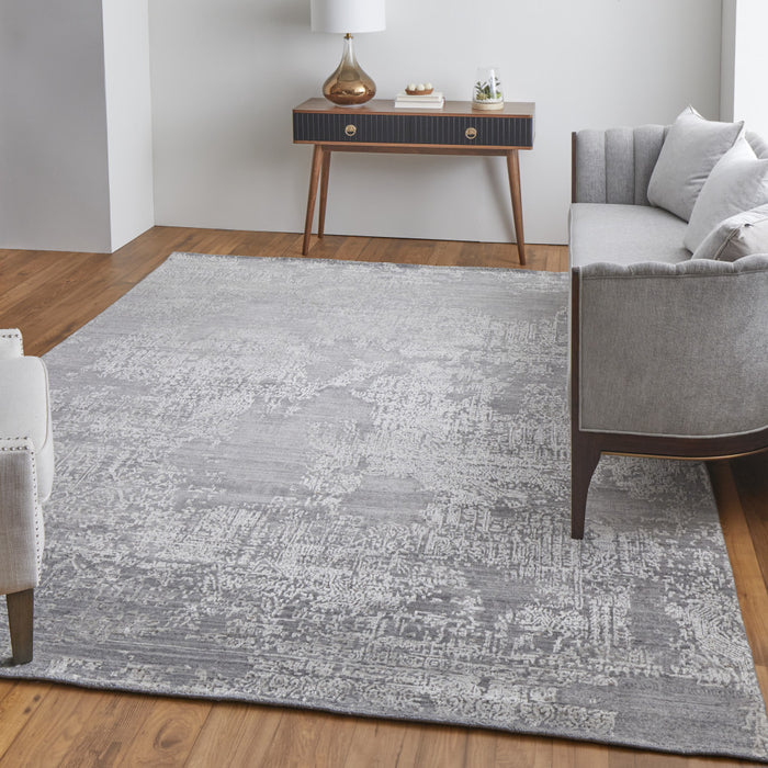 4' X 6' Gray and Ivory Abstract Hand Woven Worn Faded Area Rug