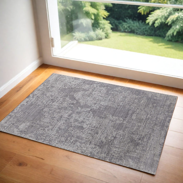 4' X 6' Gray and Ivory Abstract Hand Woven Worn Faded Area Rug