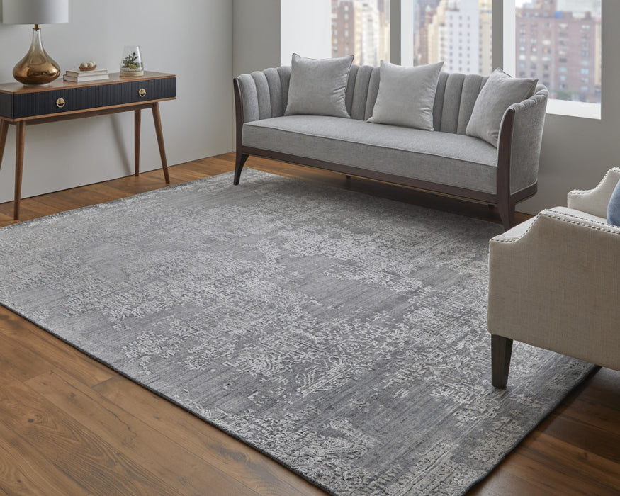 4' X 6' Gray and Ivory Abstract Hand Woven Worn Faded Area Rug