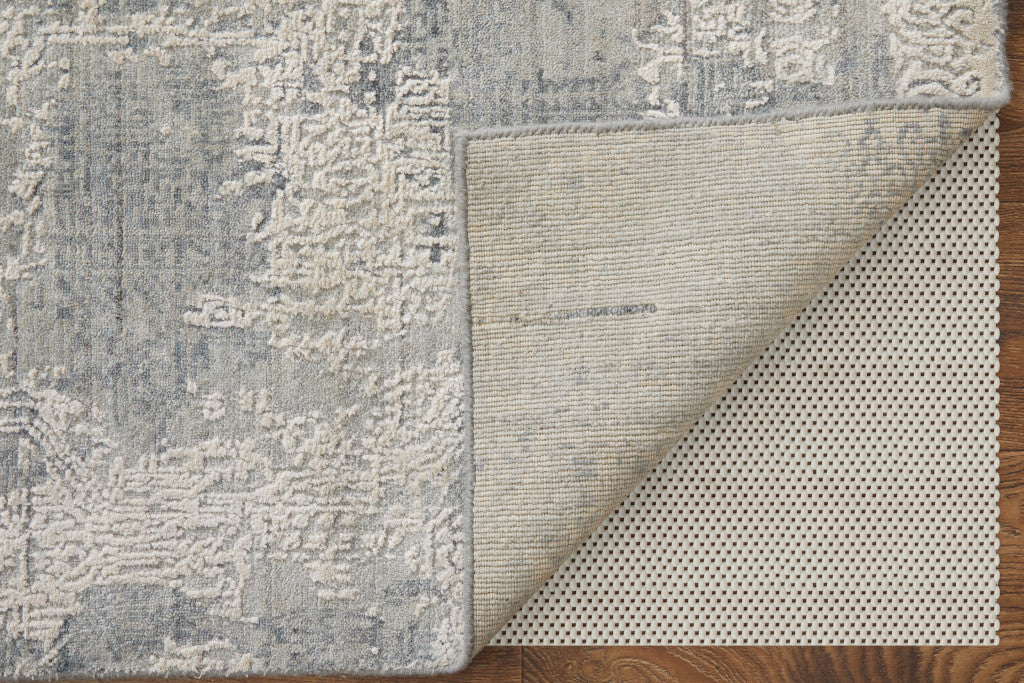 4' X 6' Gray and Ivory Abstract Hand Woven Worn Faded Area Rug