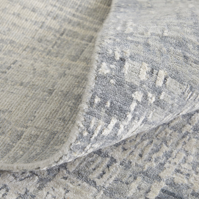 5' X 8' Gray and Silver Abstract Hand Woven Worn Faded Area Rug