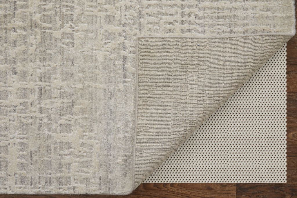 5' X 8' Ivory and Gray Abstract Hand Woven Worn Faded Area Rug