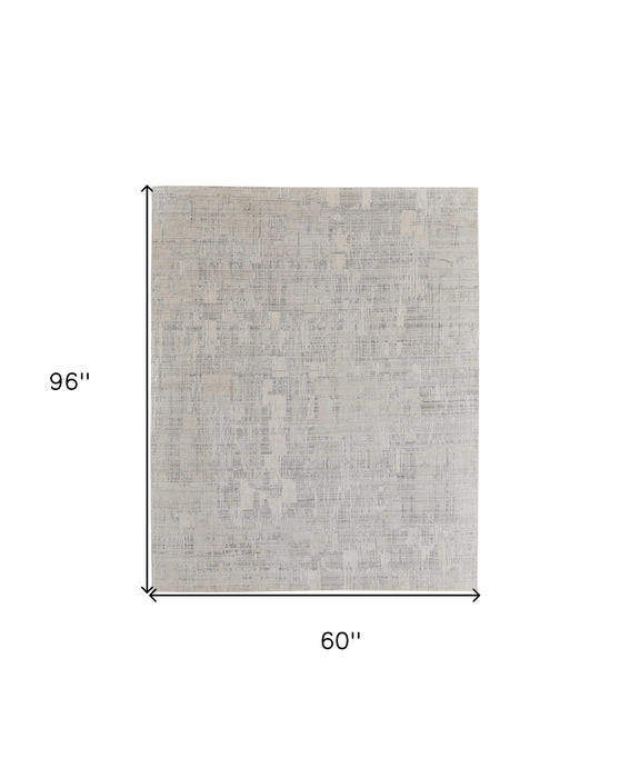 3' X 5' Ivory and Gray Abstract Hand Woven Worn Faded Area Rug