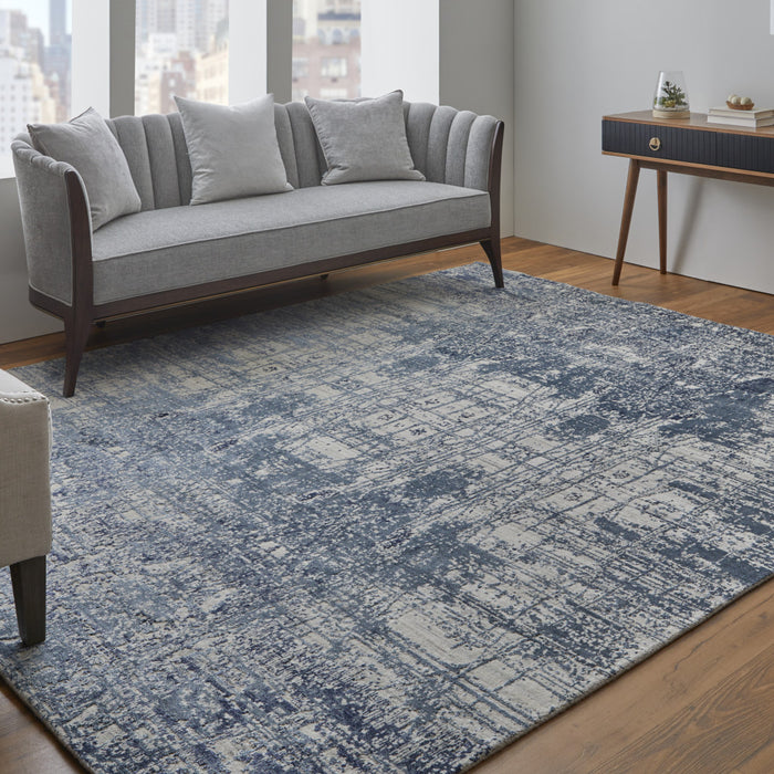 5' X 8' Blue and Ivory Abstract Hand Woven Worn Faded Area Rug