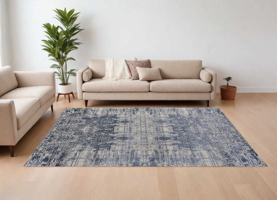 5' X 8' Blue and Ivory Abstract Hand Woven Worn Faded Area Rug