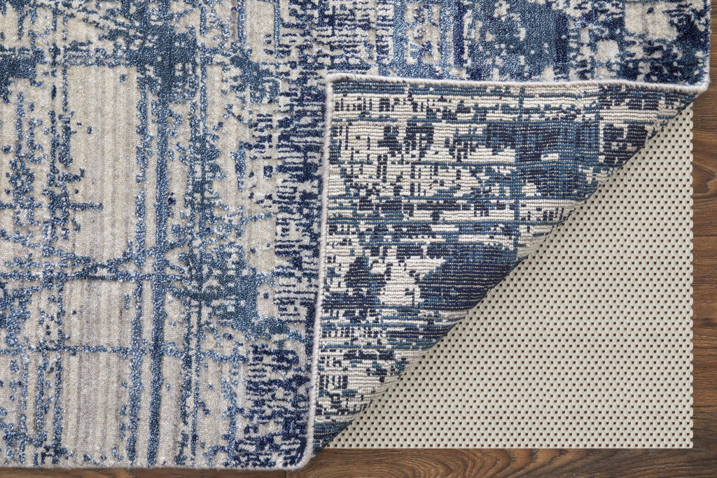 5' X 8' Blue and Ivory Abstract Hand Woven Worn Faded Area Rug