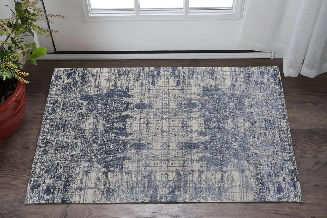 5' X 8' Blue and Ivory Abstract Hand Woven Worn Faded Area Rug